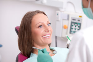 Female patient visitng a dentist for immediate dentures